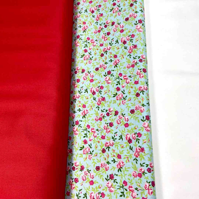 Tissu coton vert petites fleurs roses et rouges