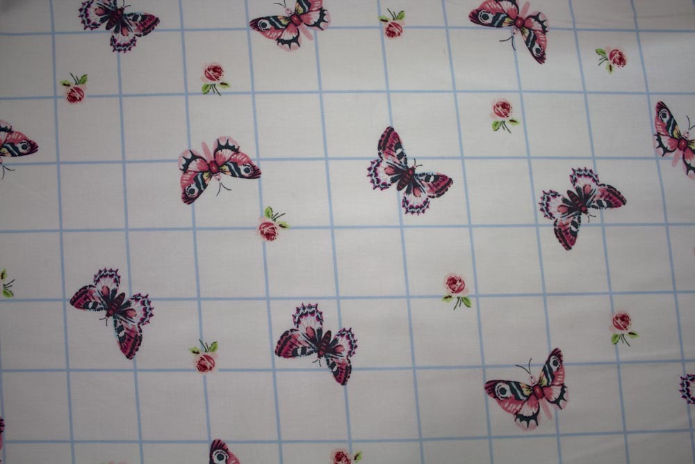 Tissu coton Gütermann rose et papillon sur carré