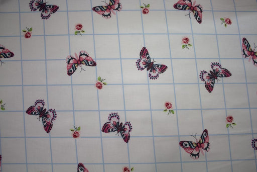 Tissu coton Gütermann rose et papillon sur carré